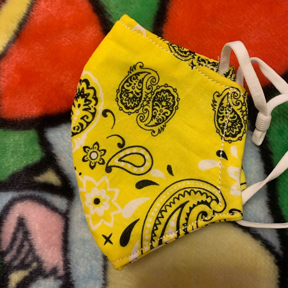 A Bright Yellow Face Mask